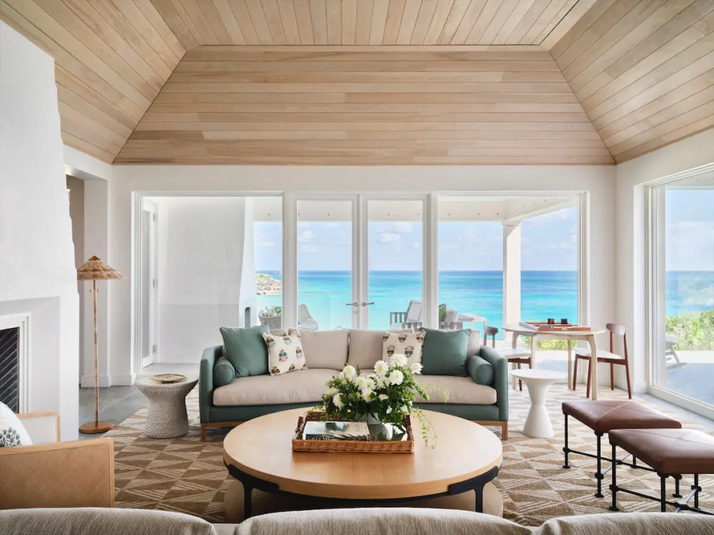 The living room’s tray ceiling is ash. Holly Hunt table, Lawson-Fenning sofa, Beauvais rug. (Photo by Douglas Friedman)