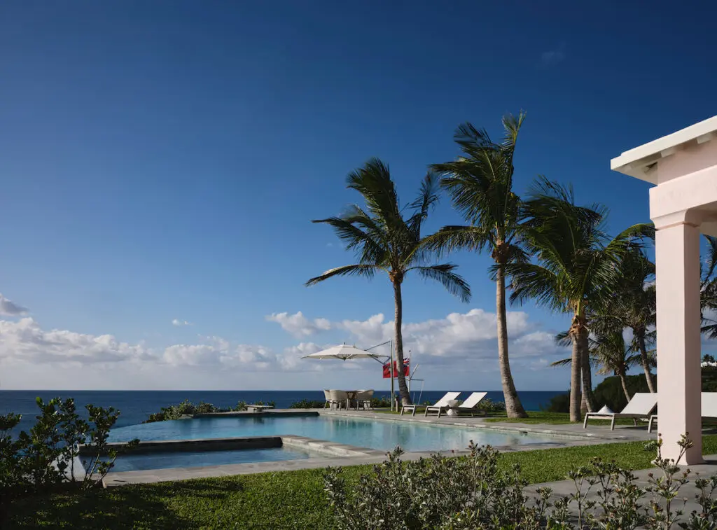 An infinity pool was tailored to the clients’ specifications. Umbrella and lounge chairs from Island Trading Limited. (Photo by Douglas Friedman)