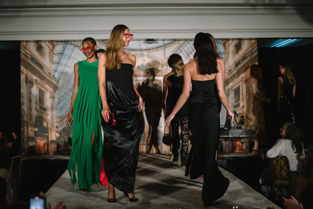 Neiman Marcus models wearing iconic red glasses on the catwalk  at the Houston Italian Cultural and Community Center Fall Luncheon. (Photo by Johnny Than)
