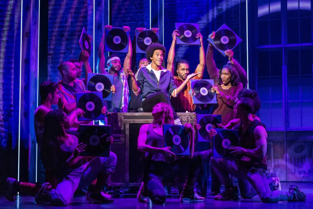 Brandon Lee Harris as the young adult 'Michael' and the cast of the MJ First National Tour. (Photo by Matthew Murphy)