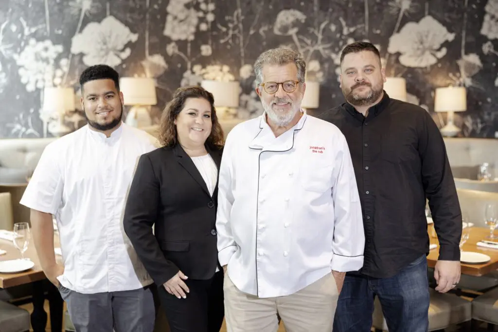 It's all in the family.. The Levine restaurant family includes Jay Forrest (Jonathan’s grandson who recently graduated from Culinary Institute of America), Jessica Levine (daughter who runs Memorial Green location), Jonathan Levine (founder and owner), Sam Levine (son who runs Campbell Place location). (Photo by Lauren Holub )