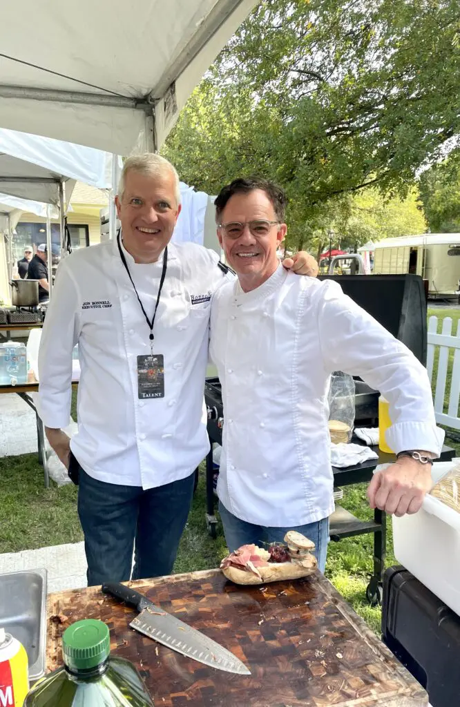 Chefs Jon Bonnell and Gerard Thompson brace for the feeding frenzy at Chefs for Farmers Dallas event. (Photo by Courtney Dabney)