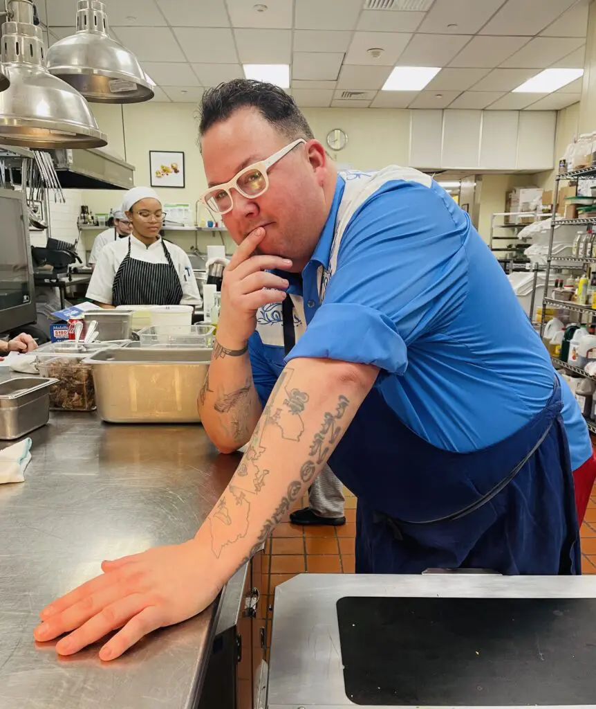 Chef Graham Elliot takes a time out to strike his signature pose. (Photo by Courtney Dabney)