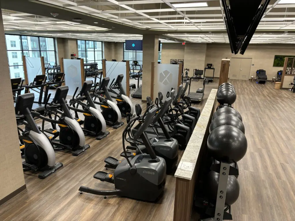 The cardio equipment at Life Time is plentiful, but there is plenty of floor space for those working with weights doing lunges.