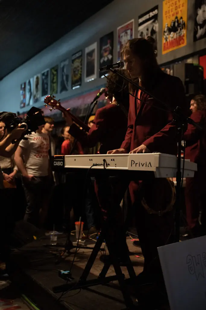 Topline Addicts performing at Red Zeppelin Records, McKinney, TX, in March 2023. (Photo by Emily McClure)
