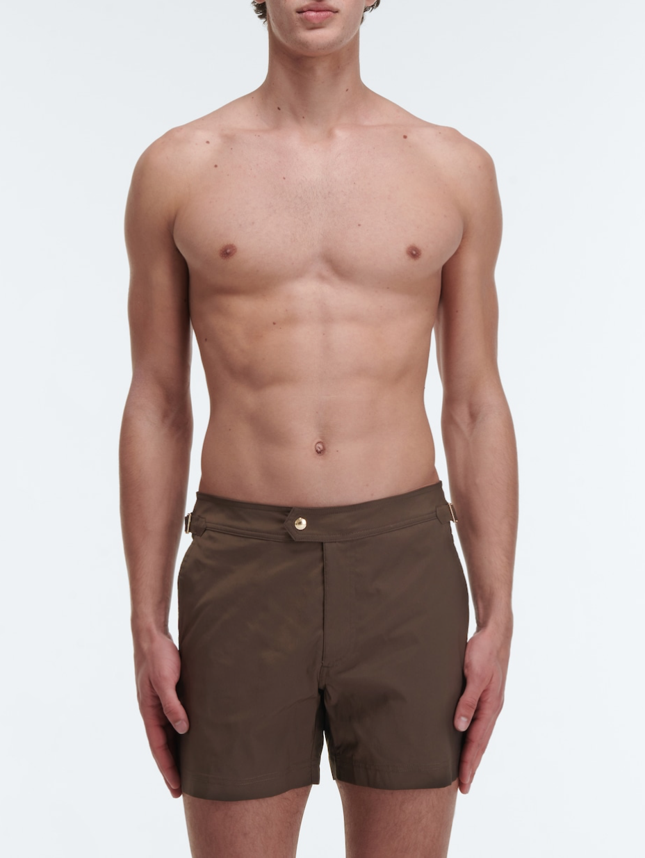 Tom Ford brown swim trunks ($490), available at select Tom Ford boutiques and mytheresa.com