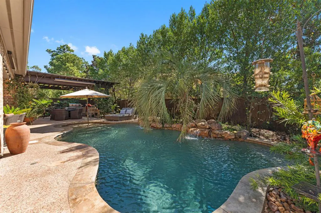 The resort-style pool is the perfect place to unwind. Every day can be a vacation at this home. 