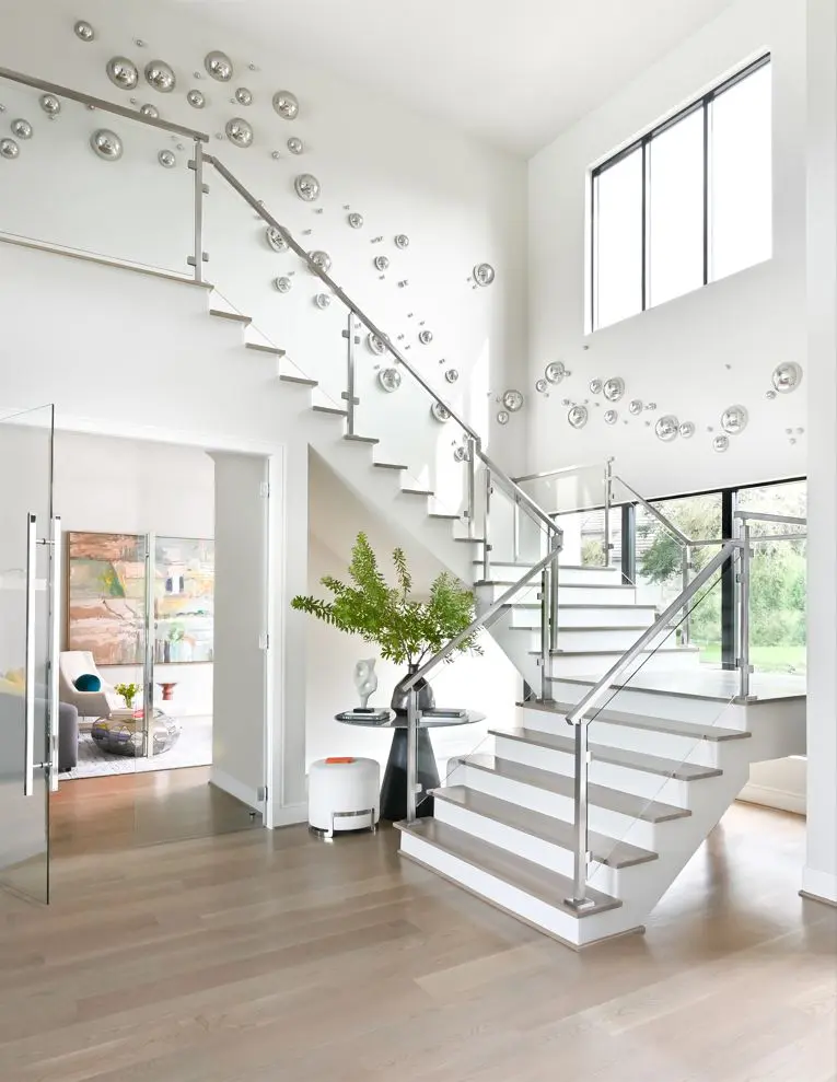 The two-story foyer is the at the heart of this Carlton Woods mansion.