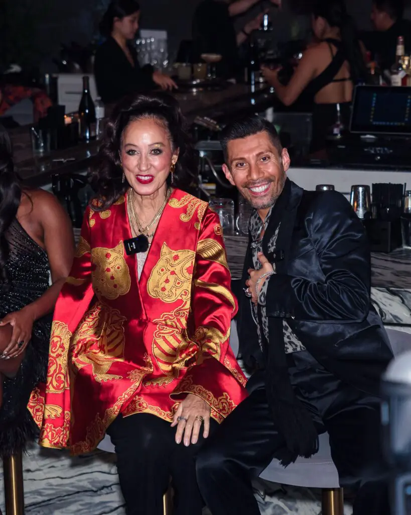 Headliners model Pat Cleveland and film producer Antonio Contreras at the 50th anniversary celebration of the fashion Battle of Versailles. (Photo by Torry Sledge)