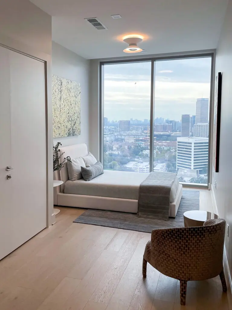 A secondary bedroom in The Dunlavy floor plan in Residences at The Allen on tour at the luxe property's grand opening.  (Photography by Robert Taylor V)