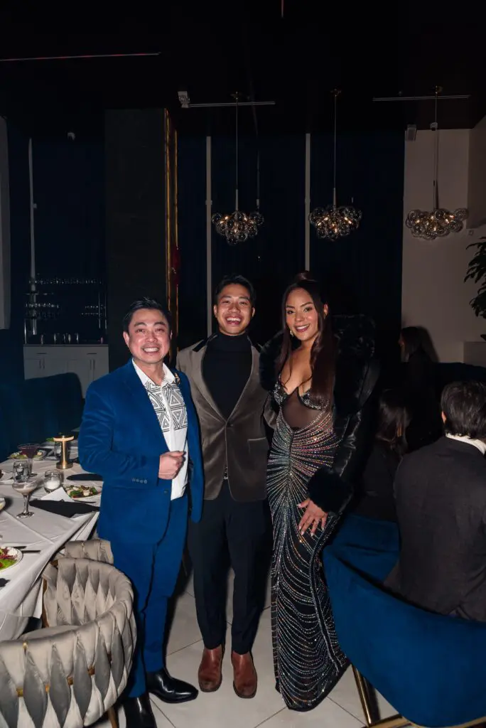 Jonathan Huynh, Ben Le and Chavona Kirkwood at the 50th anniversary celebration of the fashion Battle of Versailles.  (Photo by Torry Sledge)