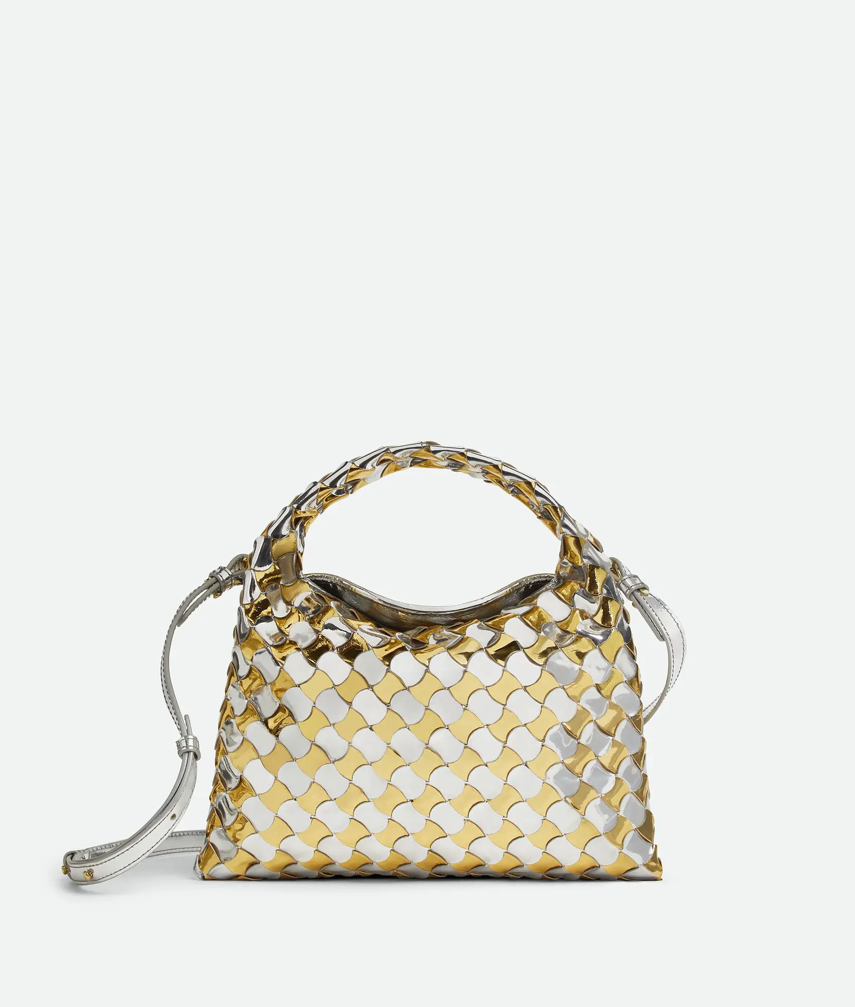 Bags – Bottega Veneta’s silver and gold mirror laminated mini hop Intrecciato hobo bag.