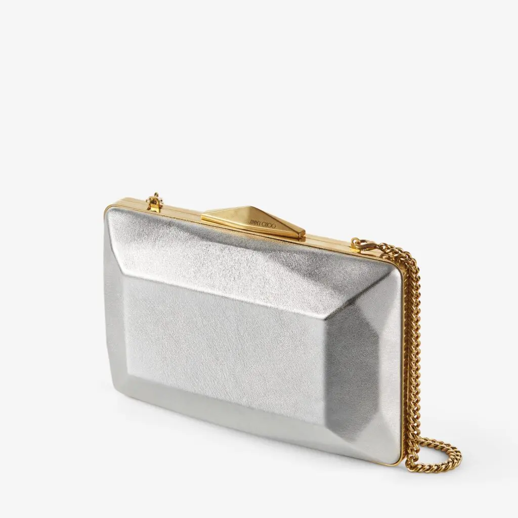 Jimmy Choo's diamond box clutch in silver with gold accents.