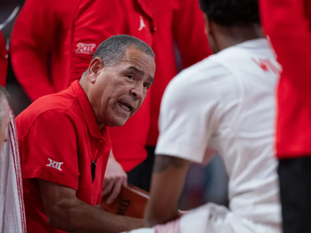 University of Houston head coach Kelvin Sampson always knows what to say in a huddle. (Photo by F. Carter Smith)