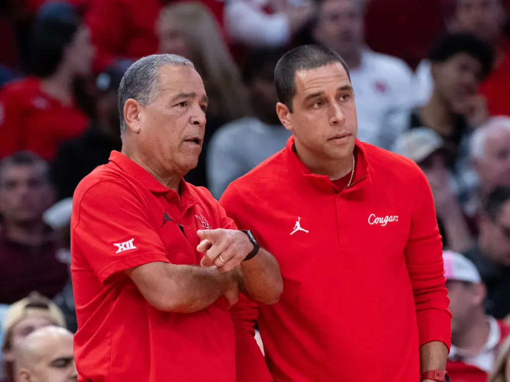 University of Houston coach Kelvin Sampson and assistant Kellen Sampson are part of one of the nation's best coaching staffs. (Photo by F. Carter Smith)