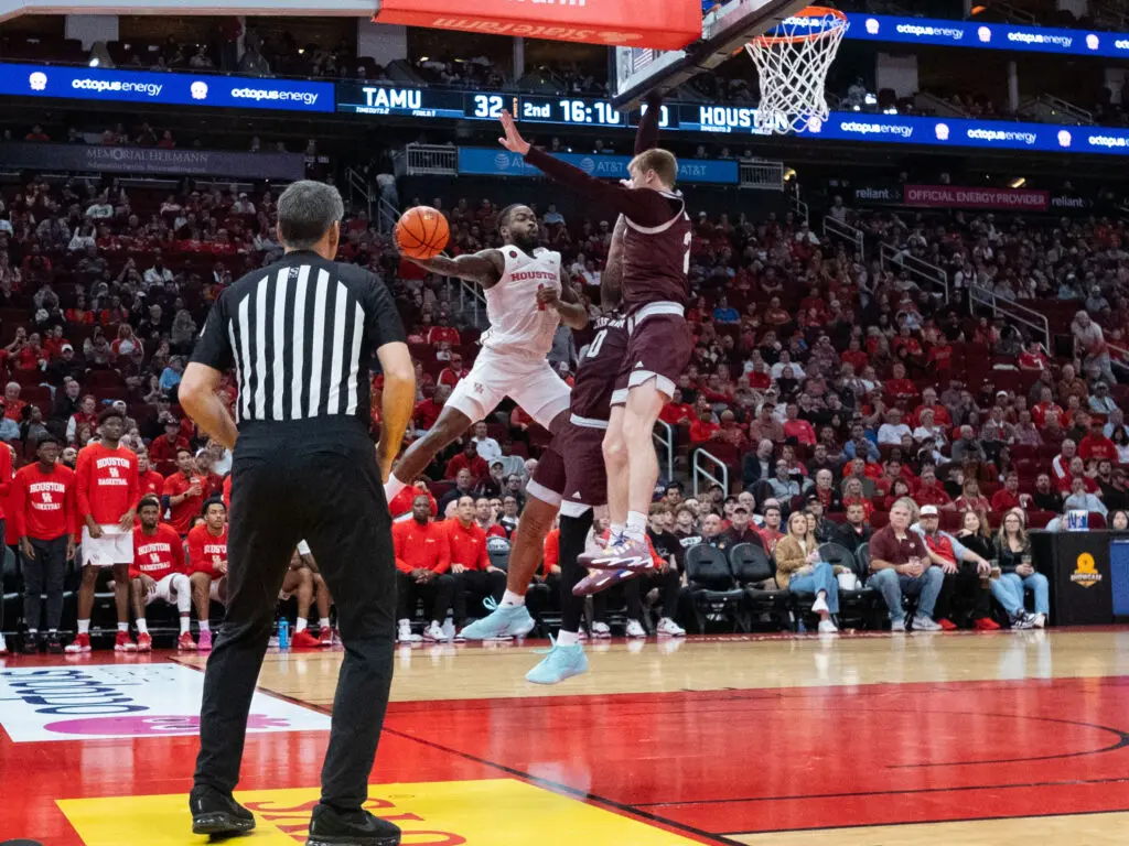 University of Houston point guard Jamal Shead finds passing openings that others cannot see. (Photo by F. Carter Smith)