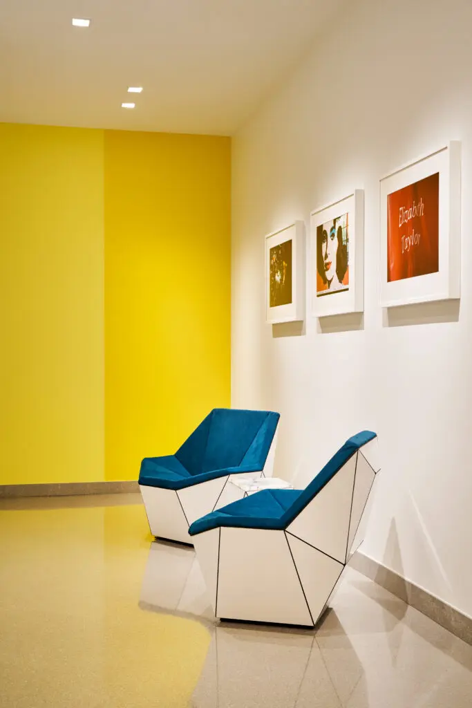 A seating area at Forty Five Ten with Knoll Washington Prism lounge chairs by Sir David Adiave. (photo by Stephen Karlisch)