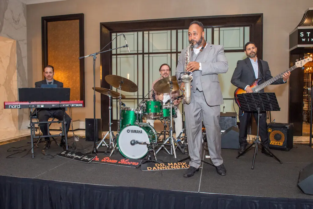 Dr. Jose-Miguel Yamal, Dr. Mark Dannenbaum, Dr. Dean Moore and Tim Ruiz performing at the Arts of Healing Foundation Physician Art Show and Dinner at the Post Oak Hotel (Photo by Jacob Power)
