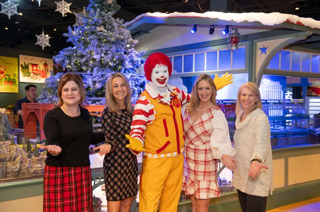 Elizabeth Dacus, Lindy Berkley, Ronald McDonald, Leigh Danley, and Jill Cumnock at the sneak peek of the 2023 Trains at NorthPark.