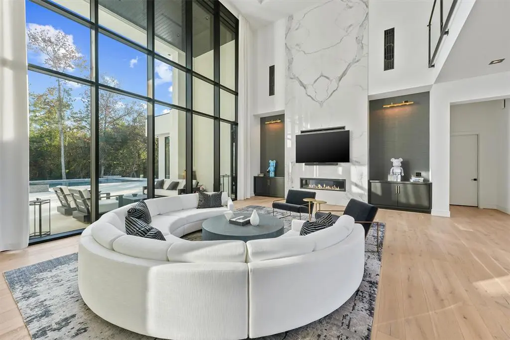 The interior design is chic with plentiful natural light throughout the home.