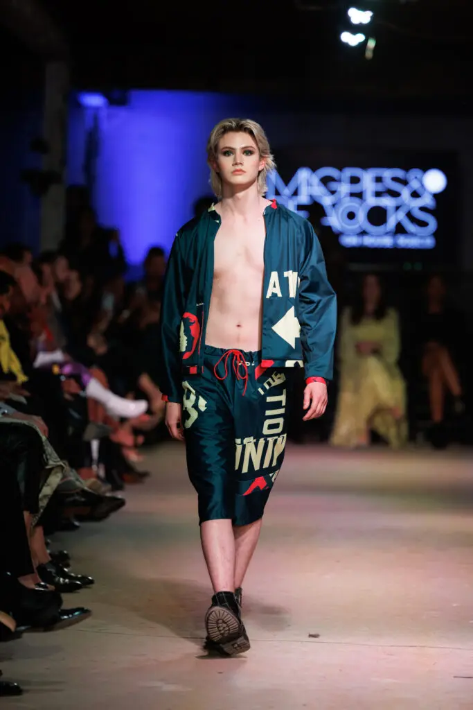Neal Hamil Agency model Leo Gossett on the runway at Magpies & Peacocks After Dark (Photo by Jay Marroquin)