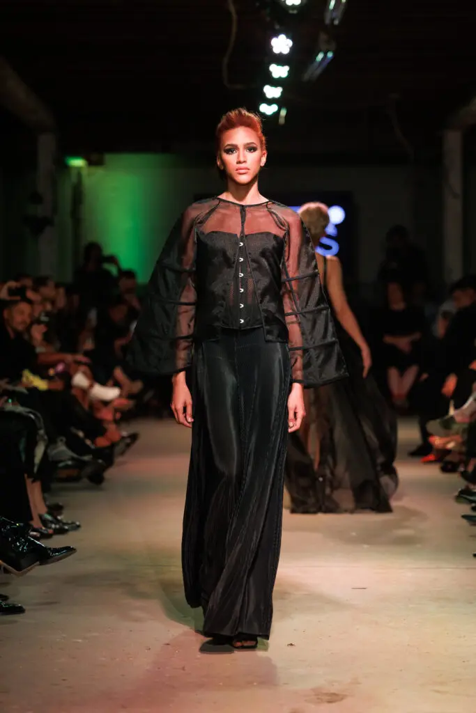 Neal Hamil Agency model Samiah Brown on the runway at Magpies & Peacocks After Dark (Photo by Jay Marroquin)
