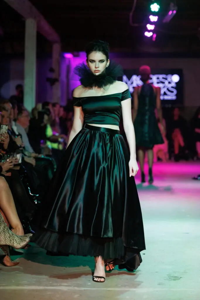 Neal Hamil model Mandy Simon on the runway at Magpies & Peacocks After Dark (Photo by Jay Marroquin)