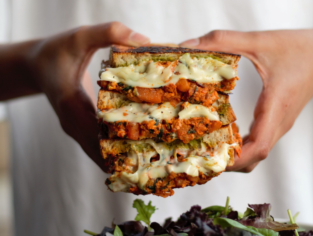 Spice Zest's Mumbai Grilled Tandoori Chicken Panini ($12.95) is made with fresh spiced Indian BBQ Chicken, roasted red peppers, mixed green salad and Desi. (Photo by Sunil Srivastava )