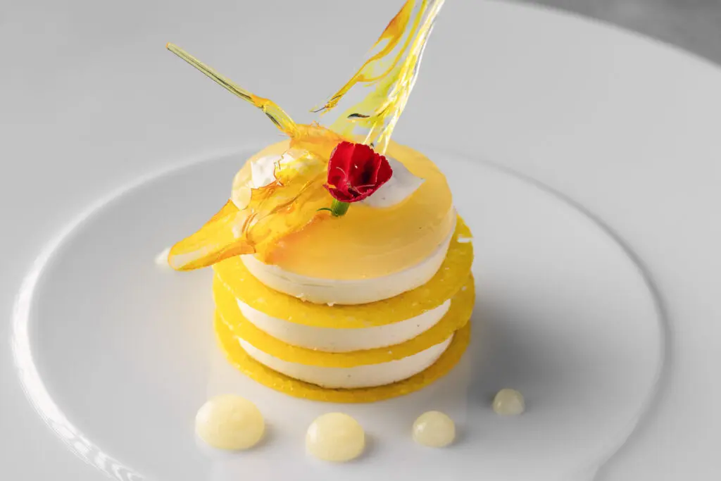 End your meal with Cocody's Philadelphia vanilla cheesecake mille-feuille with lemon ginger drops – crystal sugar ($17). (Photo by Mickael Zibi )