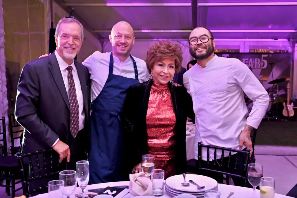 Phillip Royalty, Chef Chris Haatuft, Trini Mendenhall-Royalty, Chef Paul Qui at the Baylor College of Medicine 'Culinary Stars Shine for Cancer Research' dinner at POST Houston (Photo by Alejandro Montoya)