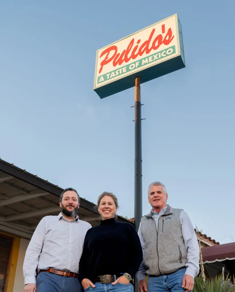 The Westland Restaurant Group team has acquired an iconic Fort Worth legend, Pulido's Mexican. Pictured from left, Marc McBride, Gigi Howell, and Bourke Harvey. (Photo by Leo Wesson)