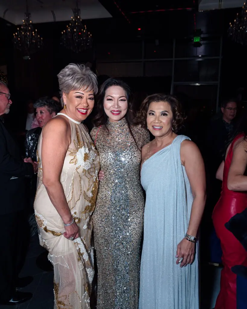 Rosalina Lydster, Amanda Ton, Trang Le at the 50th anniversary celebration of the fashion Battle of Versailles.  (Photo by Torry Sledge)