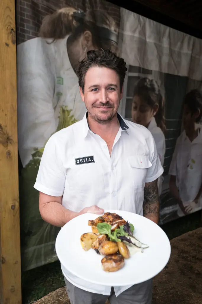 Chef Travi McShane of Ostia at the Delicious Alchemy dinner. (Photo by Daniel Ortiz)