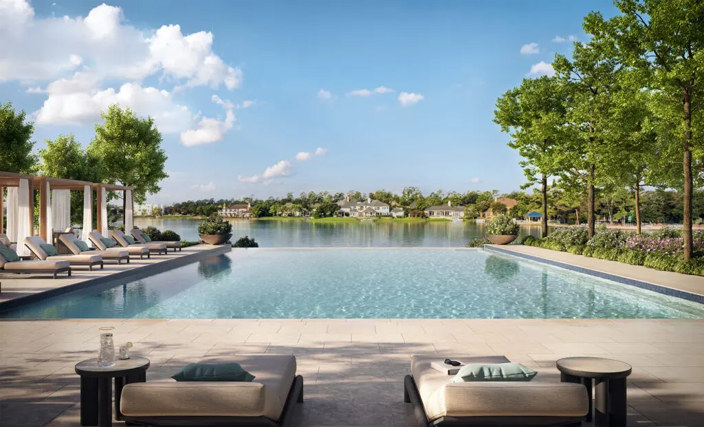 The infinity pool overlooks Lake Woodlands at Ritz-Carlton Residences, The Woodlands. (Photo by Courtesy Howard Hughes)