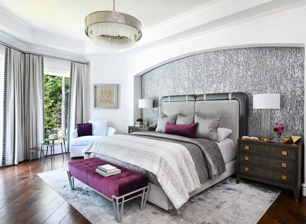 Custom bedding and drapery panels are just part of what comes from the in-house workshop at Charbonneau Interiors. (Photo by Charbonneau Interiors)