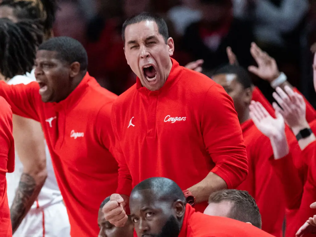 University of Houston assistant coach Kellen Sampson is as intense a sideline force as you'll ever see. (Photo by F. Carter Smith)