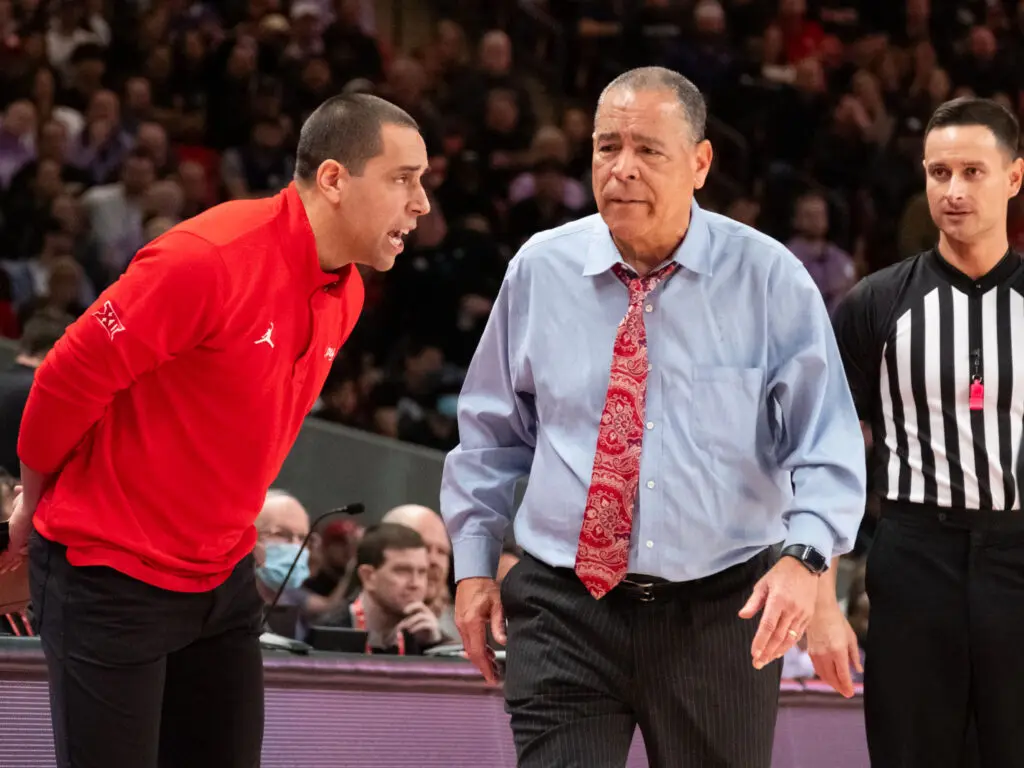 University of Houston assistant Kellen Sampson and head coach Kelvin Sampson work great together as a father son combination. (Photo by F. Carter Smith)