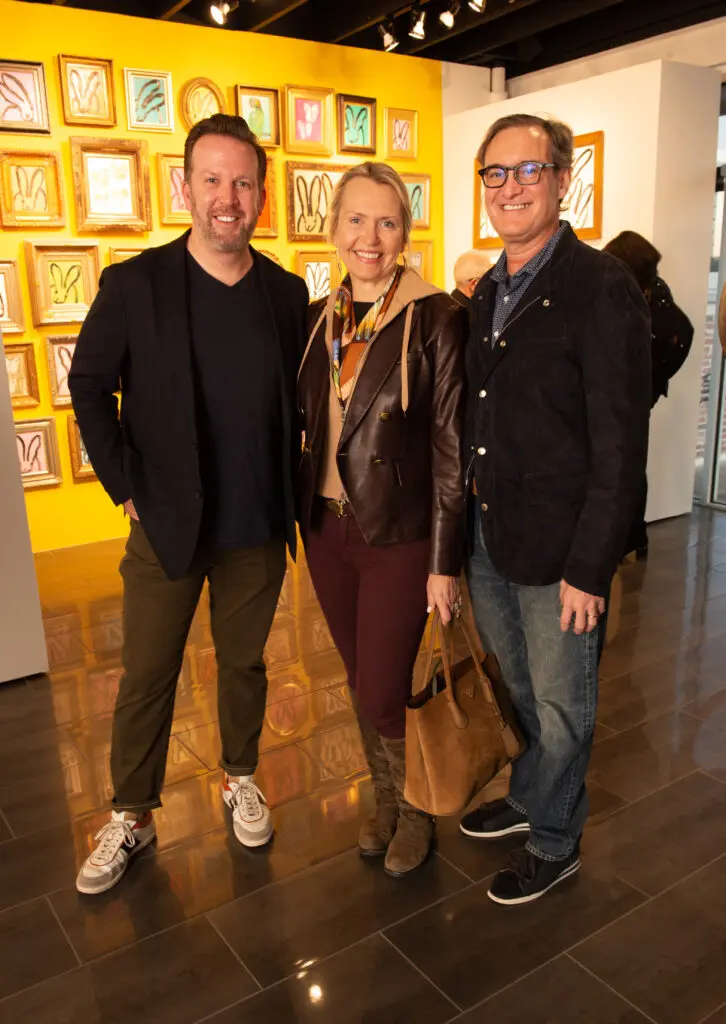 Dan Houchard, Susan & John Long at Laura Rathe Fine Art's "Hunt Slonem: Hare Salon" (Photo by George Fiala)