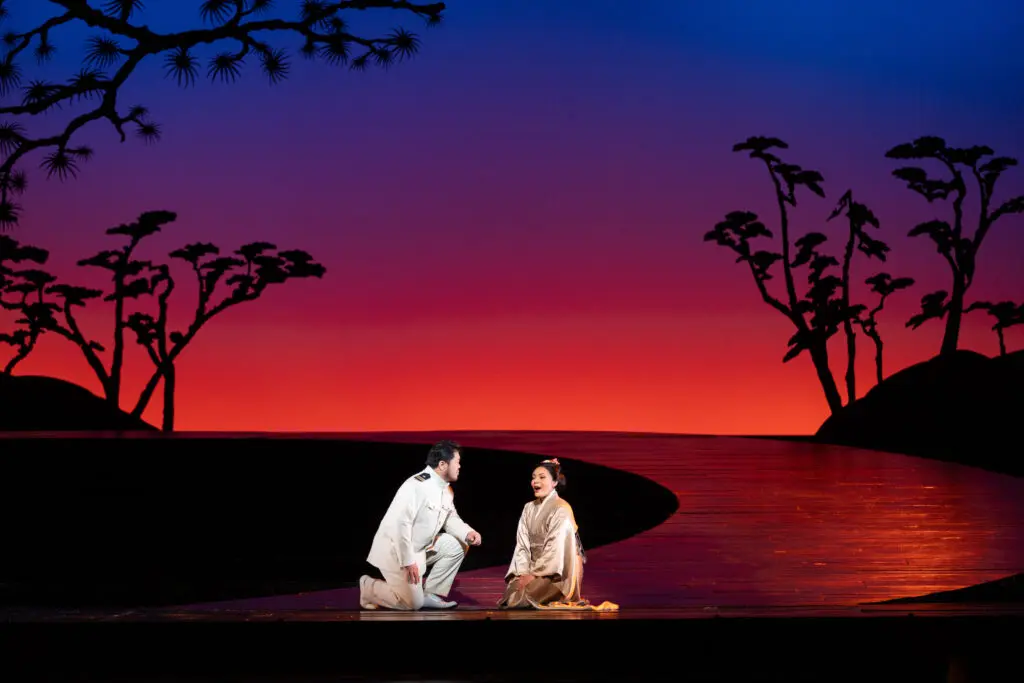 Yongzhao Yu as Pinkerton and Ailyn Pérez as Madame Butterfly in a rehearsal of Houston Grand Opera's Madame Butterfly (Photo by Michael Bishop)