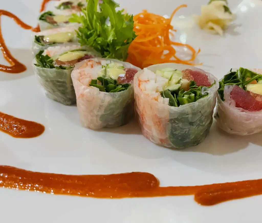 The soy paper-wrapped Spring in Paris roll plate at Megu French Japanese Cuisine is painted with spicy sriracha. (Photo by Courtney Dabney)