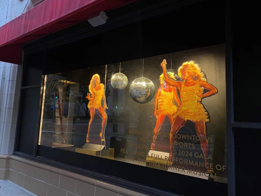 Neiman Marcus has even dedicated one of its iconic storefront windows to the production and the 2024 Broadway Dallas Gala.