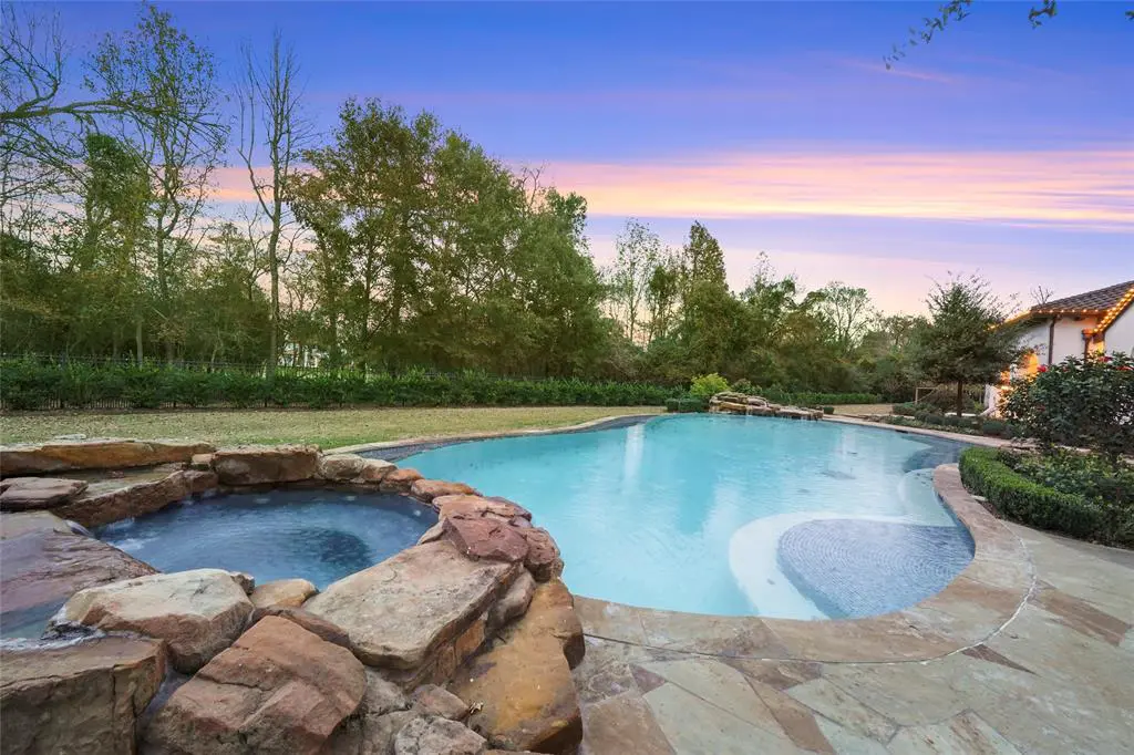 The backyard pool at 14 Hammock Dune is ideal for relaxing days.