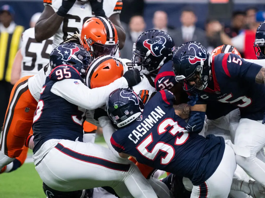 This Houston Texans defense plays — and tackles — toogether. (Photo by F. Carter Smith)