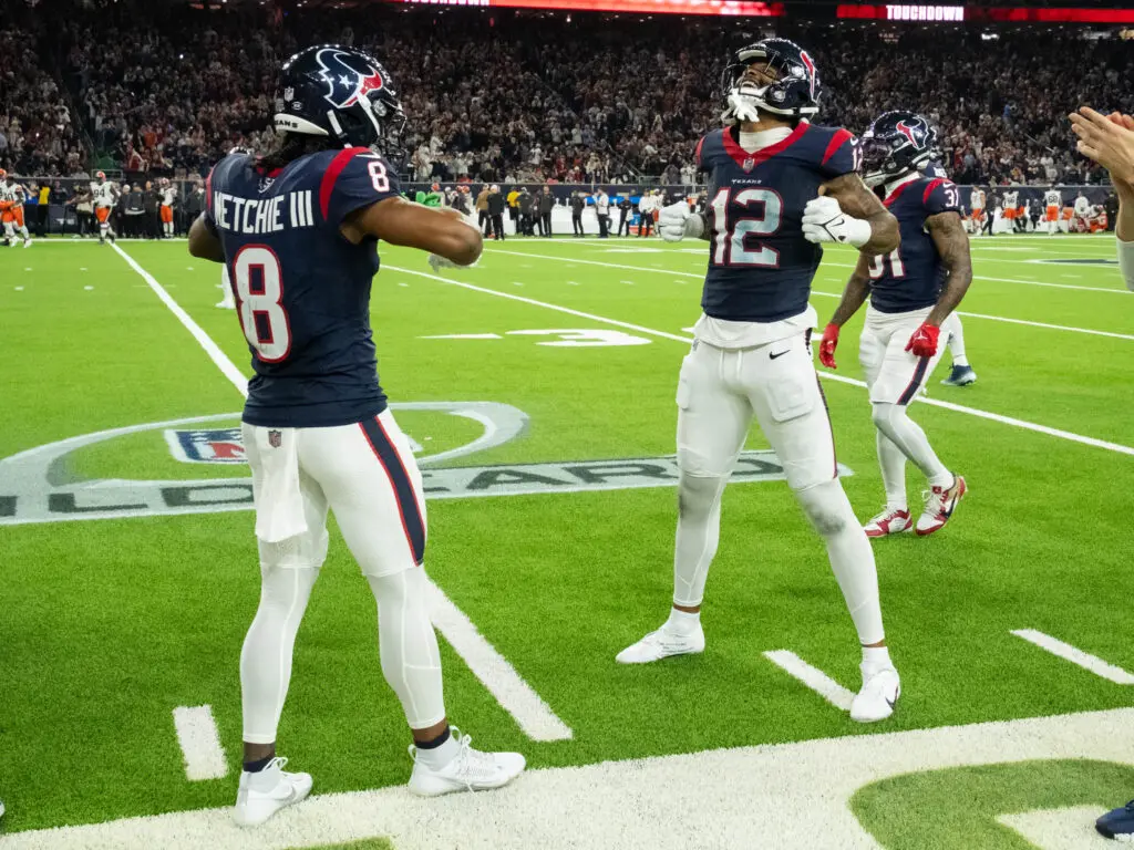 Houston Texans receivers  John Metchie III and Nico Collins know how to celebrate a moment. (Photo by F. Carter Smith)