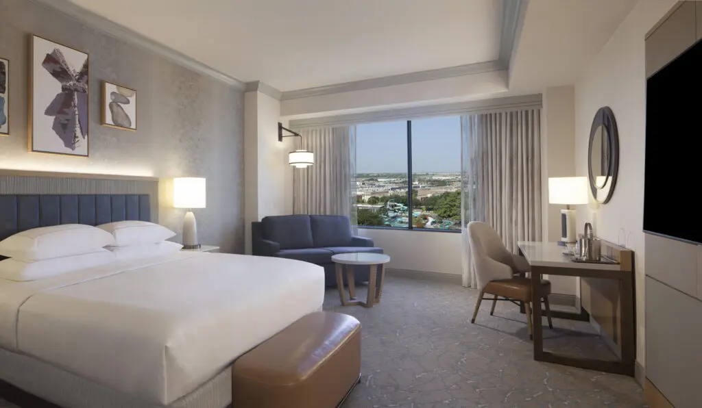 This thoughtful design and aesthetic creates a sense of movement and space in a Hilton Anatole guest room.