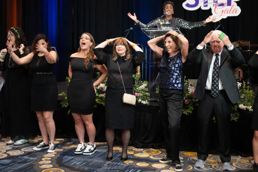 Attendees played Heads or Tails at the Seven Acres 'Next Step Gala' at the Hilton Americas-Houston (Photo by Daniel Ortiz)