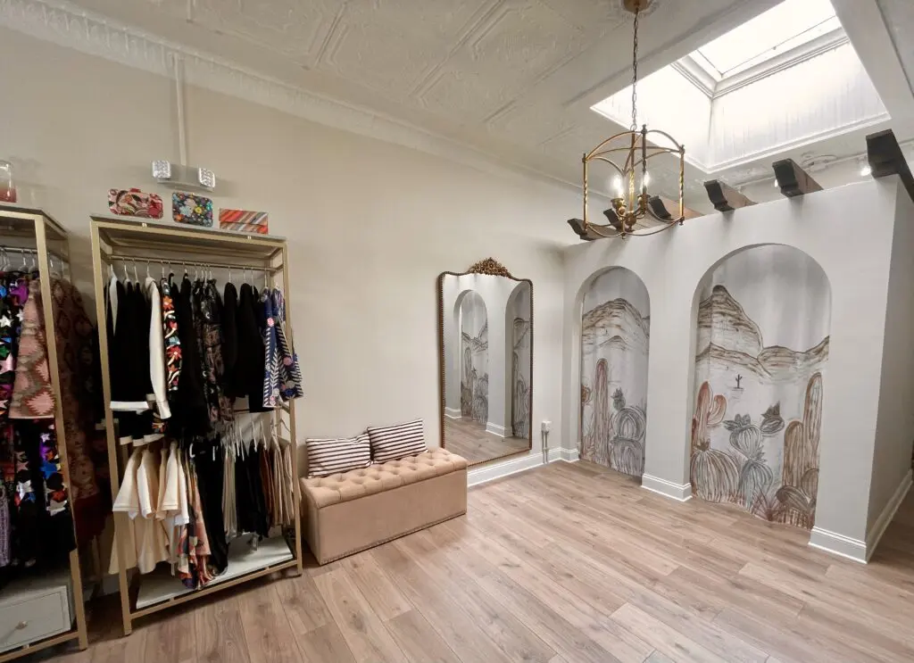 The hand-painted dressing room curtains and Santa Fe style wooden beams are a not to the original Dos Femmes location in El Paso. (Photo by Courtney Dabney)