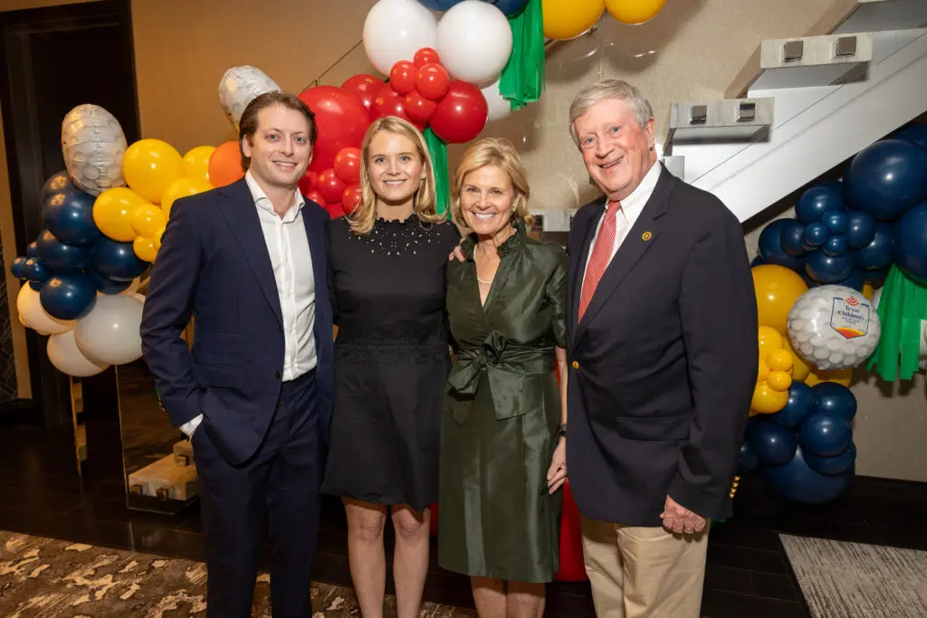 Carter Ware with Ellye Anderson, Diana  Scott Anderson at the Texas Children's Houston Open Tee-Off in the penthouse suite at the Post Oak Hotel.  (Photo by Jenny Antill)