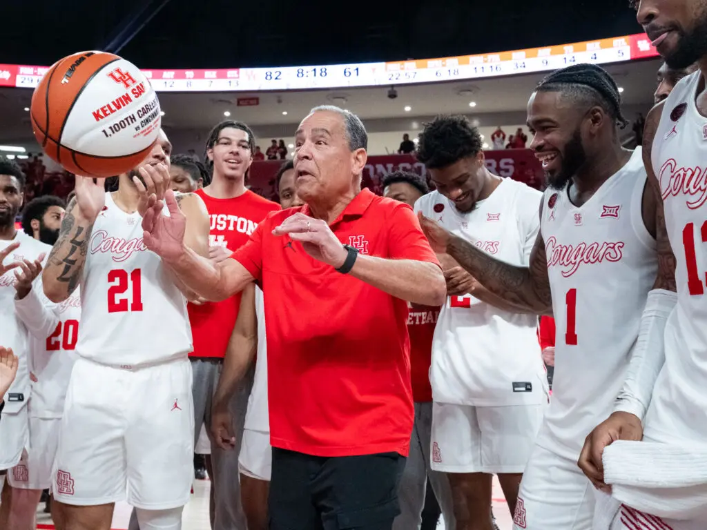 University of Houston coach Kelvin Sampson had some fun with another milestone moment with his players. (Photo by F. Carter Smith)