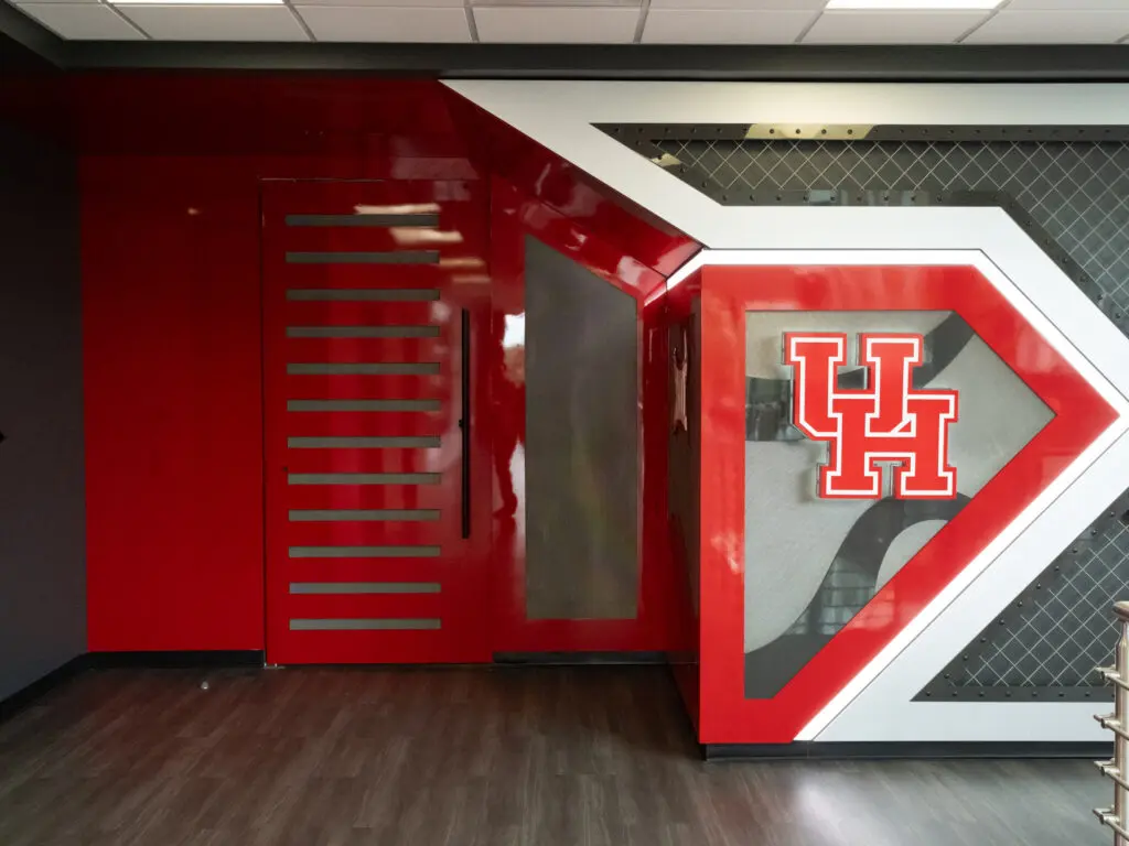 University of Houston basketball's second floor inner sanctum at Guy V. Lewis is accessed through a cool red door. (Photo by F. Carter Smith)